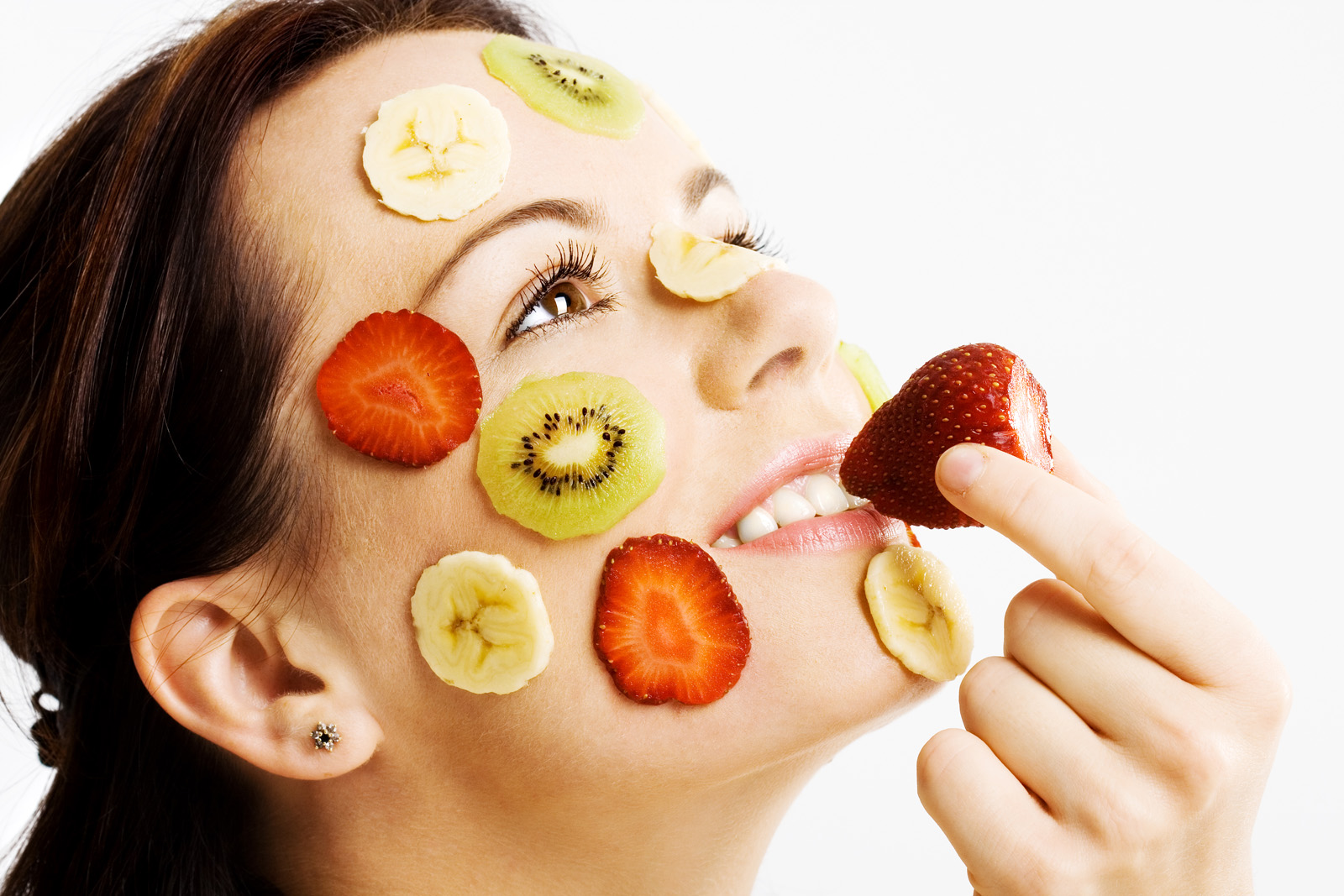 Young Female with Fruit Mask on Her Face